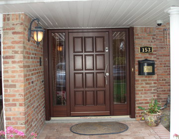 New Front door in Dark Mahogany, custom designed and crafted in Austria, equipped with Fingerprint access