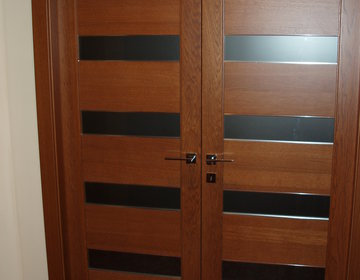 Master Suite double door with bronze frosted glass brings natural light and provides privacy at the same time
