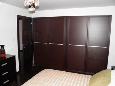 Custom closet doors in guest bedroom