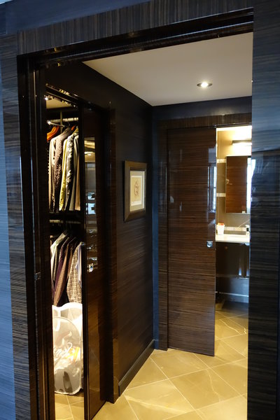 Pocket doors both, in master closet and master bath to optimize space