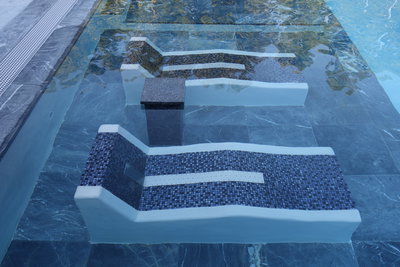 Massage Loungers in Pool
