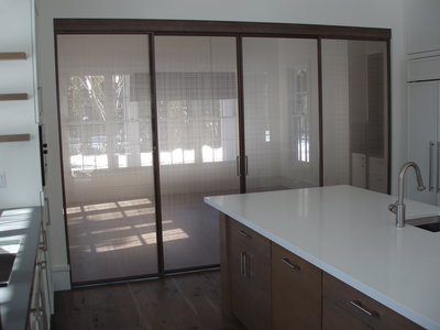 Glass Sliding door system between kitchen & Dining room