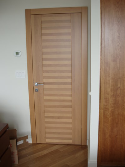 Solid wood door crafted with cherry & maple stripes