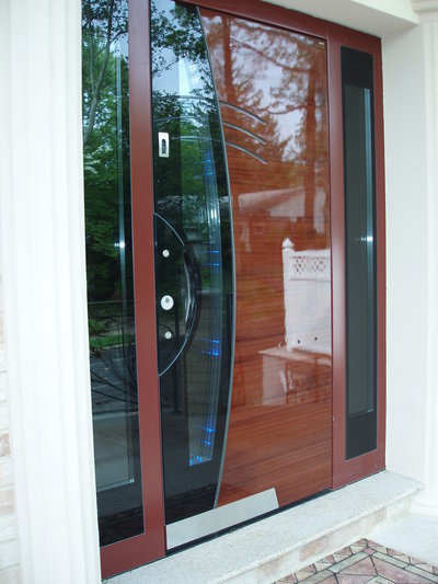 High-end Grand Entrance door (exterior view), custom designed by Bella Porta, made in Austria, features: Lacquered finish, LEDs, Fingerprint access, 5 insulated glass, double weather insulation, completely noise/cold/heat proof