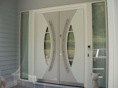 Grand Entrance.  Custom designed & crafted front door model A230, with Fingerprint access