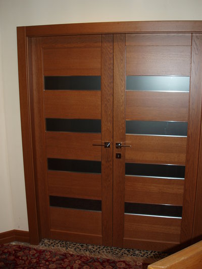 Master Suite double door with bronze frosted glass brings natural light and provides privacy at the same time