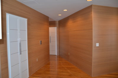 Wall panels in natural oak installed in hallway